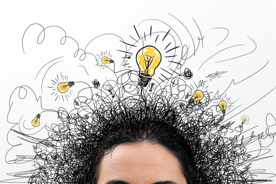 A picture of someone's hair that has lamps on it that indicates creative & critical thinking